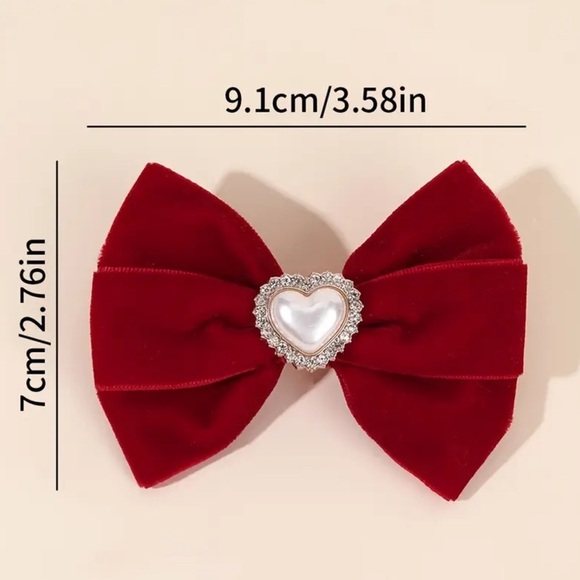 Red Bow Hair Clips with Heart Detail. Christmas Bows. Christmas hair clips ?
